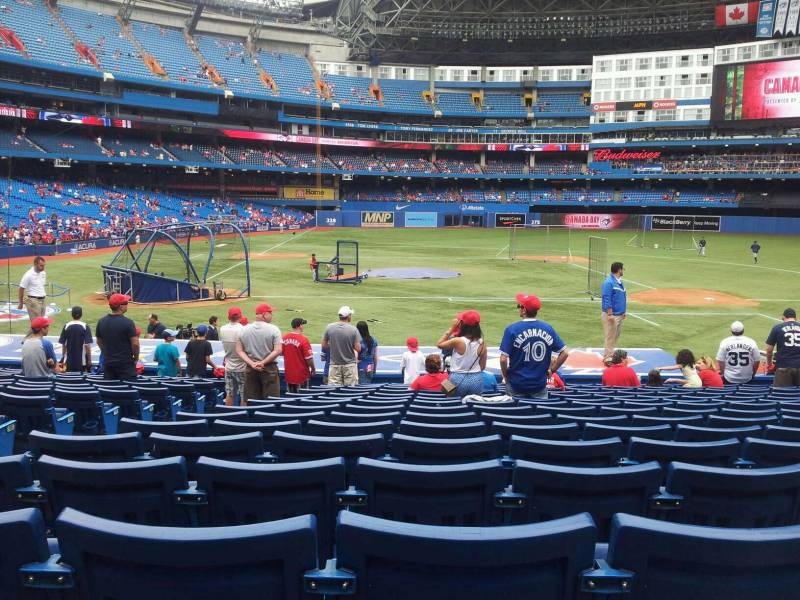 Early arriving fans slowly fill the front row seats at the Rogers Centre. © A View From The Seat