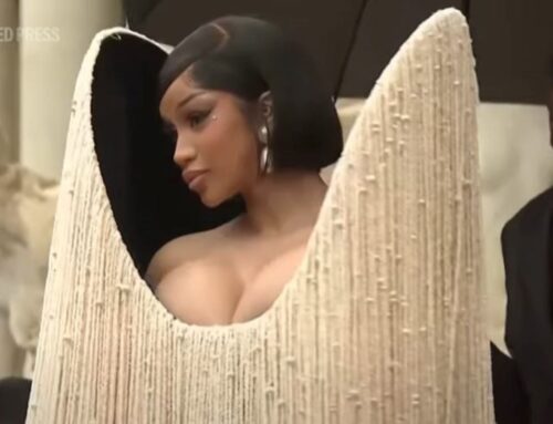 Cardi B holds a live crow at Schiaparelli’s show at Paris Fashion Week